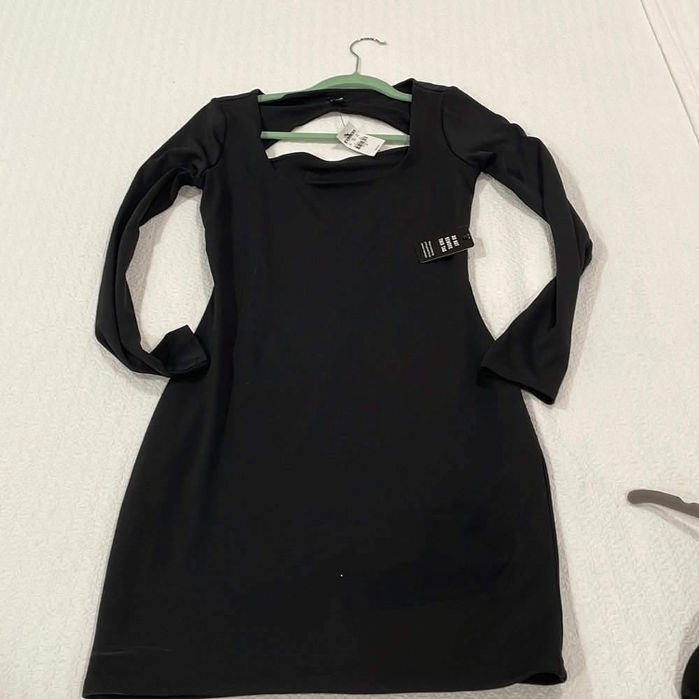 Brand New Express Contour Dress. Stretchy and soft material. Mid Length.
